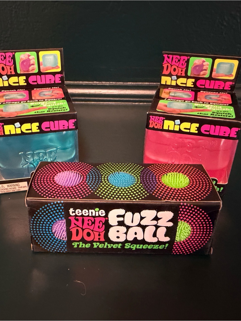 NeeDoh lot. 2 nice cubes and 3 pack of tennie fuzz balls.